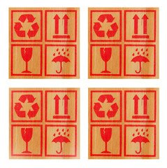 Signs and symbols for the carriage of baggage and cargo on wooden background