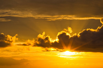 Colorful beautiful sunset with the orange cloud background