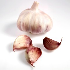 Pink Garlic, allium savitum, Clove against White Background