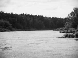 Fototapeta premium River landscape, artistic look in black and white.