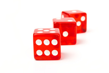 Transparent and red glass dices isolated on white background.