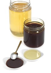 Honey and Treacle Jars against White Background