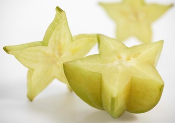 Fototapeta premium Carambola Star Fruit, averrhoa carambola, Exotic Fruit against White Background