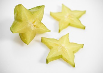 Fototapeta premium Carambola Star Fruit, averrhoa carambola, Exotic Fruit against White Background