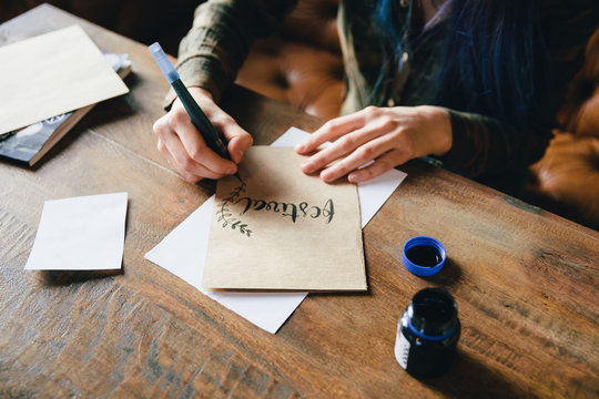 Woman practicing calligraphy