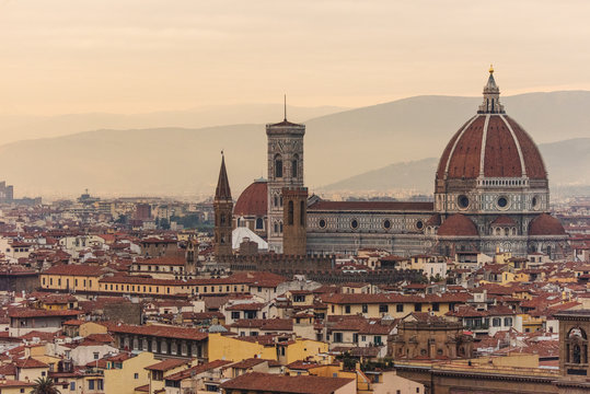 Palazzo Vecchio and Cathedral of Santa Maria del Fiore (Duomo) from Piazzale Michelangelo at sunset, Florence, Italy