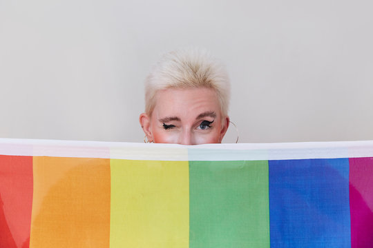 A lady with an equality flag.