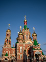 Fototapeta na wymiar Cathedral of The Annunciation of the Blessed Virgin Mary on the Brugges Embankment, Yoshkar-Ola, Russia