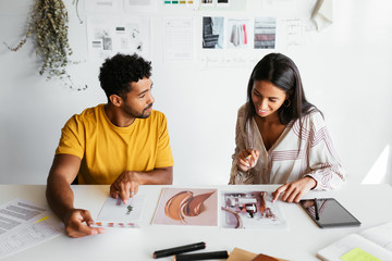 Male worker showing female client samples