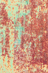 Creative bright metallic background. Flat background texture of dirty rusty metal. Bright rusty spots as the main background for a vintage scratched design