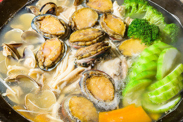 fresh seafood hot pot in boil soup