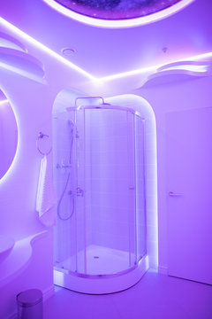 Modern bathroom with violet illumination
