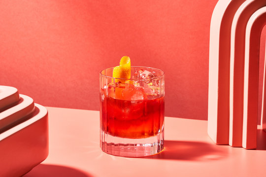 Glass of alcohol beverage with citrus