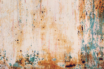 Creative bright metallic background. Flat background texture of dirty rusty metal. Bright rusty spots as the main background for a vintage scratched design
