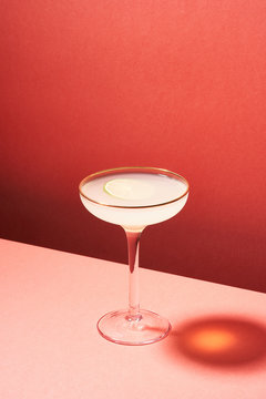 High glass with alcoholic citrus beverage