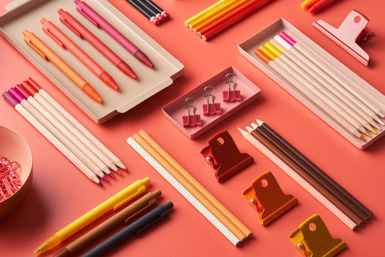 Multicolored stationery arranged on table