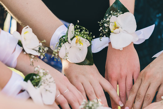 hands with corsage