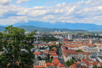 Fototapeta premium A view of the mountains over looking Ljubljana, the capital of Slovenia