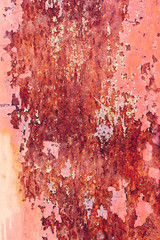 Creative bright metallic background. Flat background texture of dirty rusty metal. Bright rusty spots as the main background for a vintage scratched design