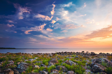 Rocky shores at the sea in sunset light