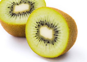 Sliced kiwi fruit on bright background