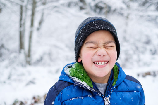 Portrait of Silly Asian Kid During Winter