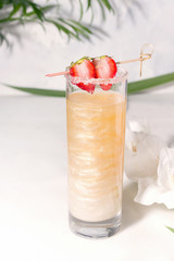 Summer drink with shimmer on white background