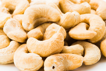 close-up cashew nuts on the white background
