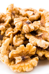 Close-up of delicious walnuts on the white background