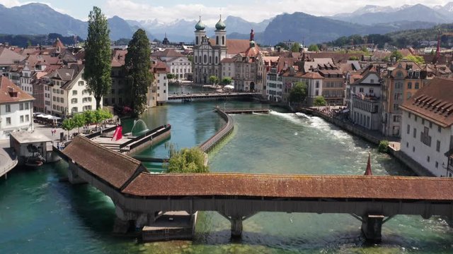 Beautiful aerial of monumental bridge over Luzern canal