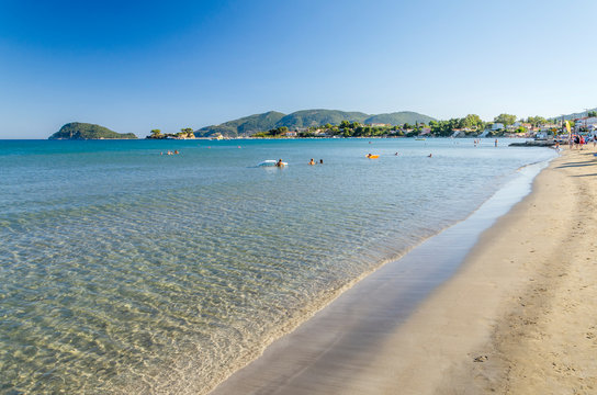 Picturesque golden sandy beach in Laganas situated on Laganas bay of Zakynthos island on Ionian Sea, Greece.