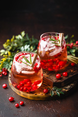 Festive Cranberry and rosemary cocktail with ice. Alcoholic or non-alcoholic cocktail