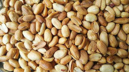 Background of fried peeled pistachios. pistachio nuts without skin. Flatly photo.