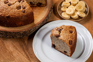 Banana cake with pieces of chocolate. Homemade cake. Top view