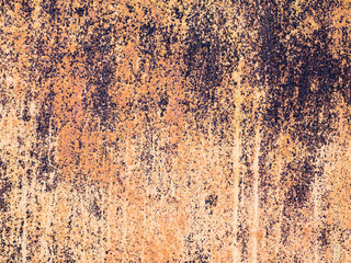 Creative bright metallic background. Flat background texture of dirty rusty metal. Bright rusty spots as the main background for a vintage scratched design