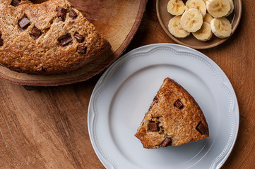 Banana cake with pieces of chocolate. Homemade cake. Top view