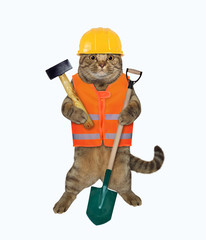 The beige cat worker in a vest, a helmet and boots is holding a shovel and a hammer. White...