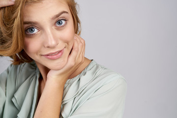 portrait of a woman in a shirt beautiful eyes close-up 