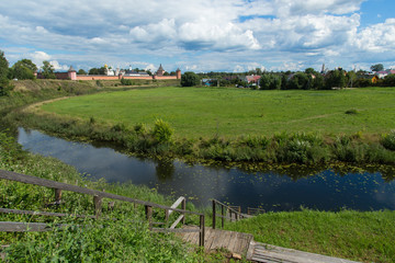 Obraz premium Suzdal, The Golden Ring of Russia, view on Spaso-Efimyevsky monastery and river Kamenka
