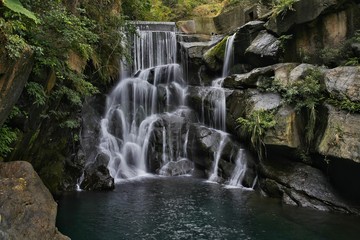 Fototapeta na wymiar Summer waterfall in Taiwan island