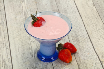 Yoghurt with strawberry in the bowl