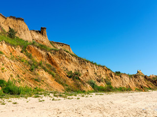 Landslide zone on Black Sea coast. Zone of natural disasters during rainy season. Large masses of earth slip along slope of hill, destroy houses. Landslide - threat to life