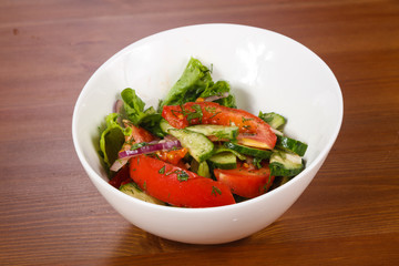 Vegetable salad with tomato, cucumbers
