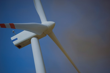 Windturbine at sunny day
