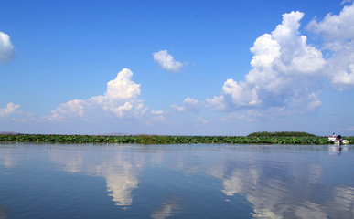 Beautiful landscape photo with a blue lake and clouds