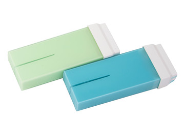 Multicolor wax in cartridge for depilation or epilation isolated on the white