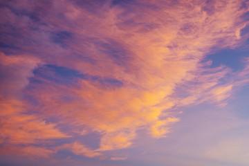 Naklejka na ściany i meble Background of colorful cloud and sky: Dramatic sunset in twilight, Beautyful of sky, Abstract and pattern of cloud background