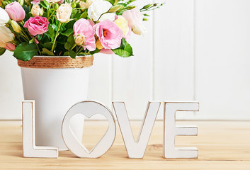 Flowers for women's day. Mother's day greeting card. Bouquet of flowers eustoma and roses in vase. Happy Birthday! Valentine's day gift. 14 February. I love you concept. Flower delivery. Flower shop