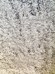 Background concrete wall, traces of weathering, worn wall damaged paint old paint. Remains of old paint on the painted concrete surface. Grungy concrete surface.