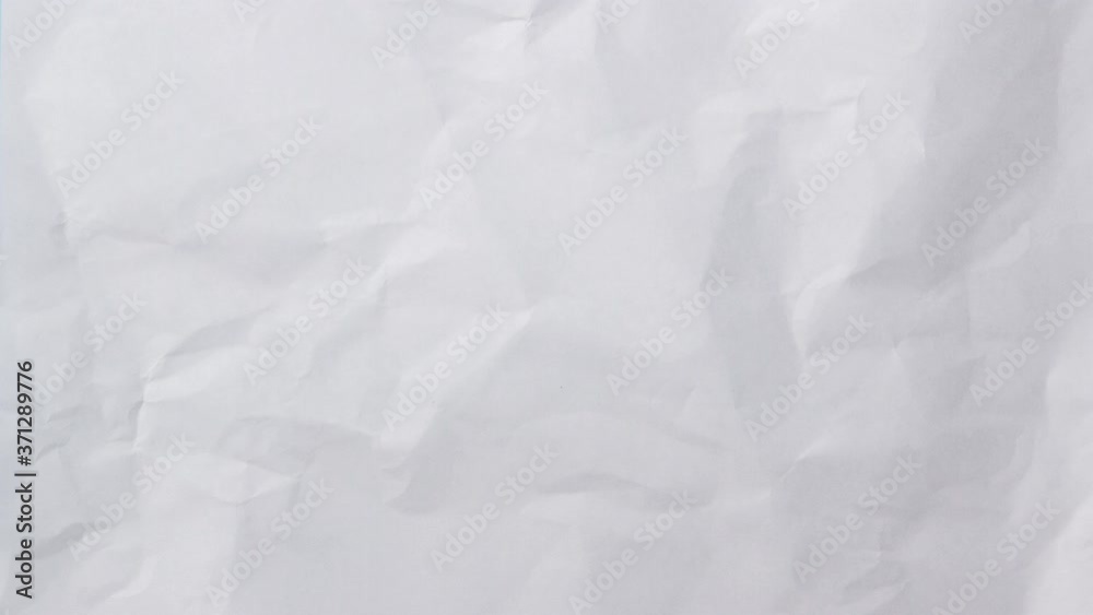 Wall mural white crumpled paper background texture. stop motion animation. seamless looping.